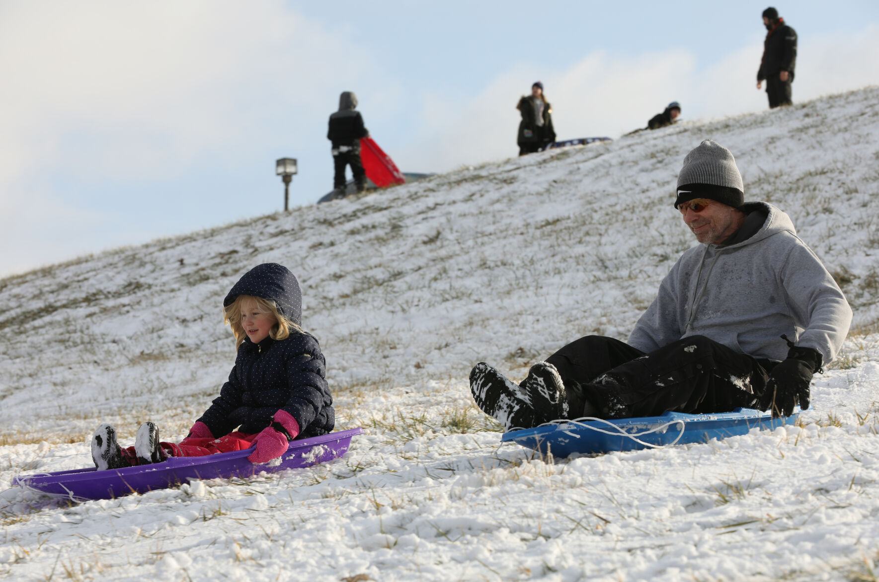 Ella Littrel and Bill Overman sled